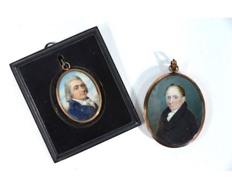 A Georgian oval portrait miniature of a gentleman with blue coat, in gilt brass frame with plaited hair in reverse, 5 x 4 cm,