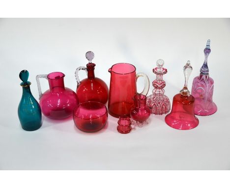 A Georgian green glass decanter for 'Rum' with gilding and blade stopper, to/w two cranberry glass table-bells, four jugs, a 