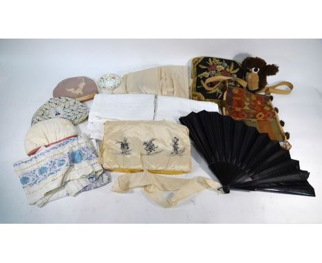 A mixed box of textiles including lady's cream peignoir/dressing robe with applied embroidery decoration and sash, white dama