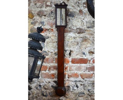 T Blunt, London, a Georgian mahogany stick barometer with silvered register, incorporating a mercury tube, 97 cm h (no glass 