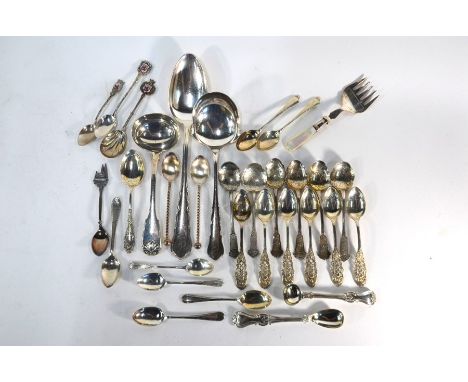 A George IV silver fiddle and shell sauce ladle, Eley &amp; Fearn, London 1822, to/w eight various silver teaspoons, 5.3oz to