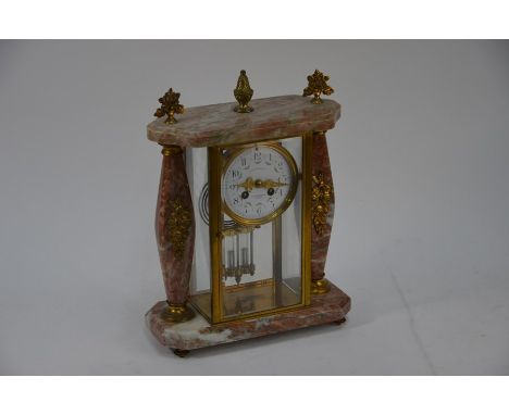 A La Renaissance, a 19th century French mantel clock, ormolu mounted veined pink marble, with two train movement striking on 