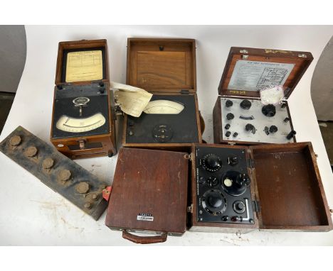 EARLY SCIENTIFIC EQUIPMENT: to include wattmeters, voltmeters, resistance boxes. All in teak cases. Names to include: Muirhea