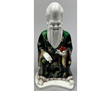 A TUSCAN WARE CHINESE 'KANG HE' FIGURE OF AN IMMORTAL, painted ceramic. 