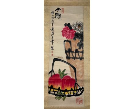ATTRIBUTED TO QI BAISHI (1864-1957): A CHINESE PAINTED SCROLL OF PEACHES AND FLOWERS,Ink and colour on paper with inscription
