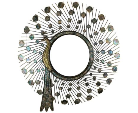 A LARGE MAITLAND SMITH STARBURST WALL MIRROR IN THE FORM OF A PEACOCK, with faux opal and brass feathers.140cm D, plate 56cm 