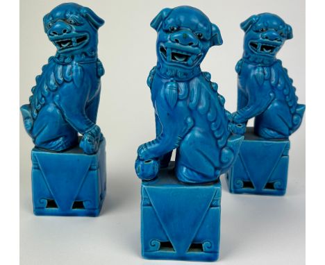 A SET OF THREE CHINESE DOG OF FOO, blue glazed ceramic (3)21cm H each**Please note this lot will be available for collection 