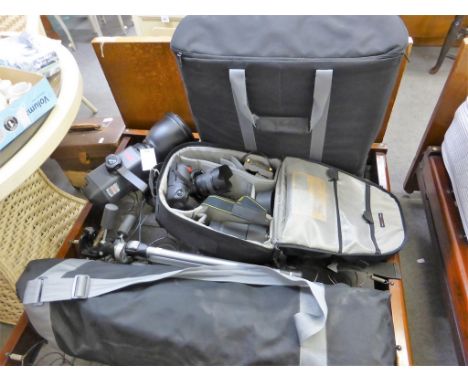 A Nikon D200 10.2MP digital SLR camera + studio lighting accessories with AF-S Nikkor 18-70mm. F3.5-4.5 lens and AF Nikkor 80
