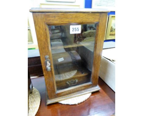 A vintage cigar humidor.