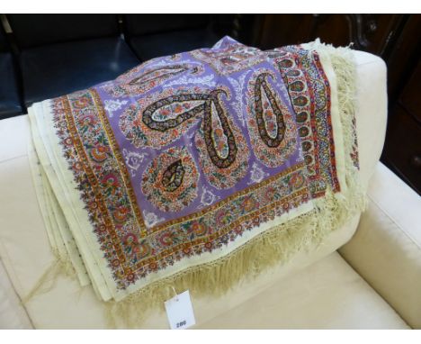 Two vintage paisley shawls.