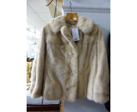 A vintage Pearl Saga mink jacket with mother of pearl buttons, bought from Pandora Guernsey.