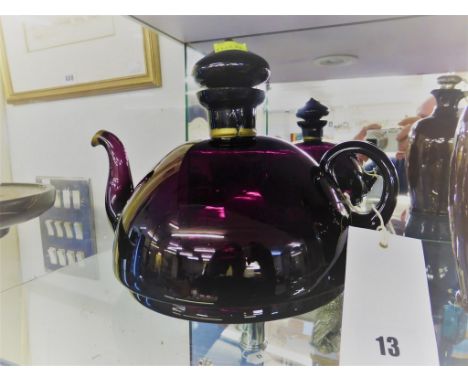 A Victorian Amethyst glass teapot.