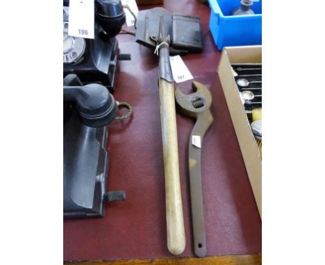 A WWII German trench spade together with an Occupation German spanner and a rifle cleaning kit case (3)