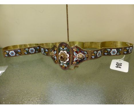 An Eastern European gilt metal and champleve enamel belt.
