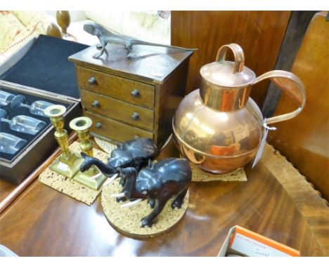 A large Guernsey copper can together with a long copper toasting fork / fire blower; a miniature mahogany three drawer collec