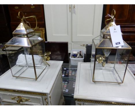 A pair of Granada glass lantern light fittings, as new, purchased from Casa Andalus, Holt Norfolk