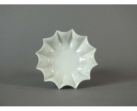 A very rare Caughley hors d'ouevres dish circa 1785-90 of star-shaped form, plain white glaze, on slight v-section foot ring,