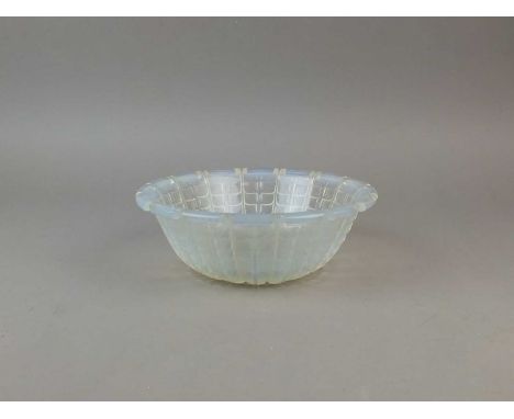 A René Lalique 'Acacia' bowl circa 1928 opalescent and frosted glass, the underside moulded with repeated leaves, moulded mar