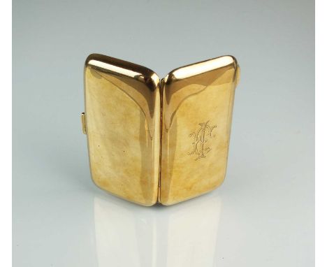 A 9ct gold combined cigarette case and compact, Henry Matthews, Birmingham 1942, of plain polished rectangular form with engr