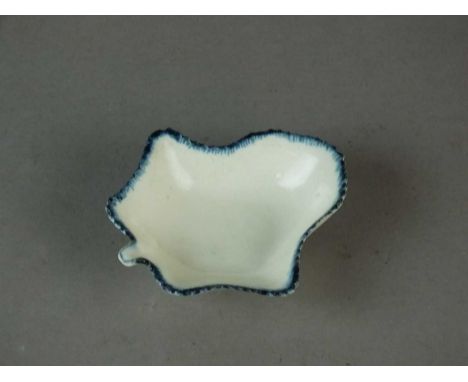 A Caughley pickle leaf dish circa 1780 of geranium leaf moulded form, painted with a single blue feather-edge border, unmarke