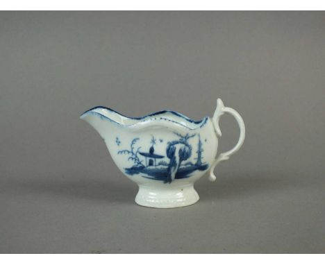 A Caughley cream boat circa 1777-85 of 'gadroon' shape, painted in underglaze blue with the 'Rock House Island' pattern below
