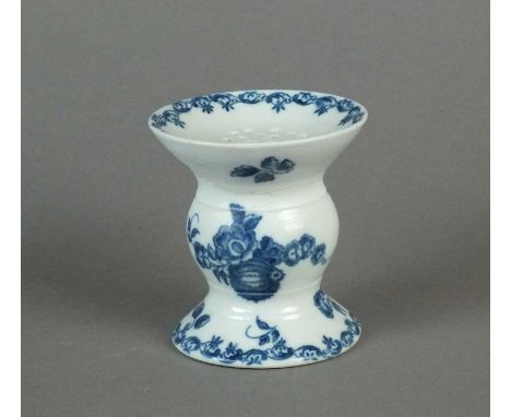 A rare Caughley pounce pot circa 1780-85 of bobbin form, transfer-printed in underglaze blue in the 'Gooseberry' pattern with