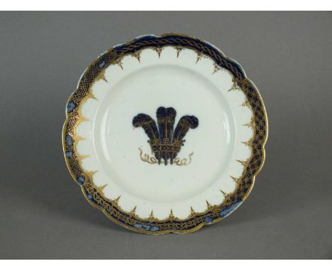 A rare Caughley trial plate circa 1785-90 of lobed form, transfer-printed in underglaze blue with the Prince of Wales feather