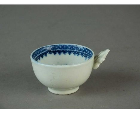 A Caughley wine taster or caddy spoon circa 1785-90 transfer-printed in underglaze blue with the Pleasure Boat pattern painte