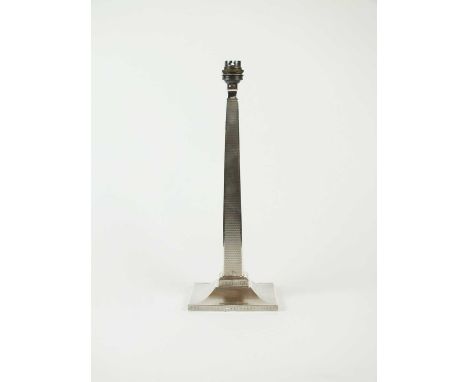 An Art Deco silver mounted lamp base, British Metallising Co Ltd, London 1937, the engine turned tapering square column with 