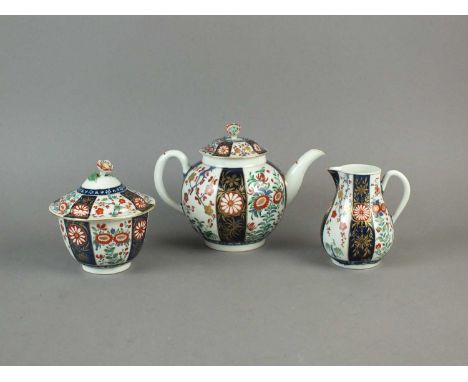 A Worcester teapot and cover, sucrier and cover and sparrow beak cream jug with cover circa 1775 decorated in the rich imari 