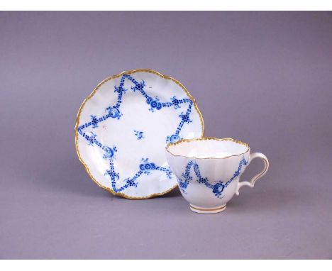 A Caughley 'Rose Festoons' teacup and saucer circa 1786-94 the cup of fluted double-ogee form with moulded ear-shape handles 