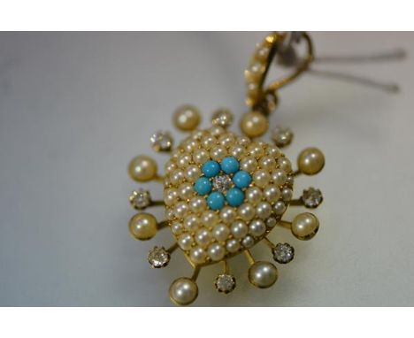 A striking seed pearl, diamond and turquoise pendant, c. 1900, of heart form, centred by an old brilliant-cut diamond within 