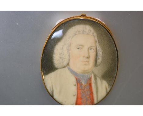 English School, c. 1760, a portrait miniature of a bewigged gentleman in a red waistcoat, watercolour on ivory, in a yellow m