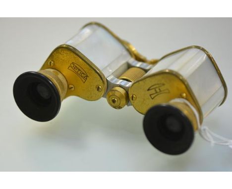 A pair of German mid-20th century mother-of-pearl mounted gilt-metal opera glasses, uncased.