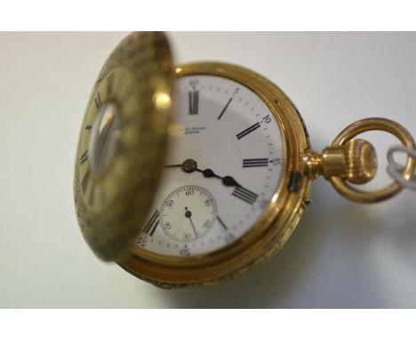 A 19th century Swiss lady's 18ct gold half hunter mourning pocket watch, the case delicately inlaid in black enamel and beari