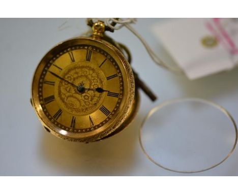 An 18ct gold open face pocket watch, the gilt dial with Roman numerals, the case with foliate engraving, glass loose, with ke