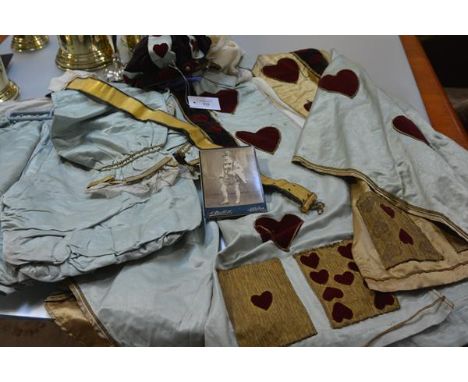 A gentleman's fancy dress costume, c. 1900, the Knave of Hearts, worked in satin and velvet, comprising cap, doublet and slee