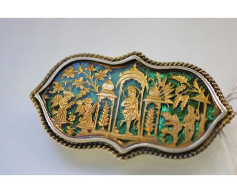 An Indian Thewa art brooch, possibly Partabargh, c. 1880, of shaped oval form, decorated with gilt figures in a pavilion agai