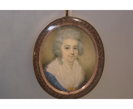 English School, c. 1800, a portrait miniature of a lady in a blue dress, watercolour on ivory, in a gilt metal frame inset wi