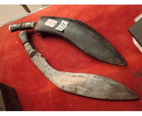 Two Indian Kukri knives one with scabbard 