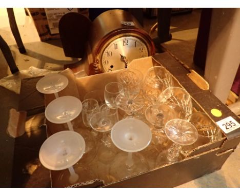 Box of glassware and a mantel clock 