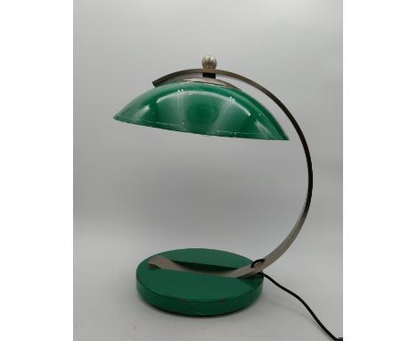 A mid-century Bauhaus style green enamel desk/table lamp with a curved brushed steel adjustable stem on a round pedestal base