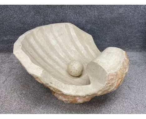 A large applied stone Art Deco style half clam shell after Magnussen Ponte with a pearl resting in the middle. L.77cm.