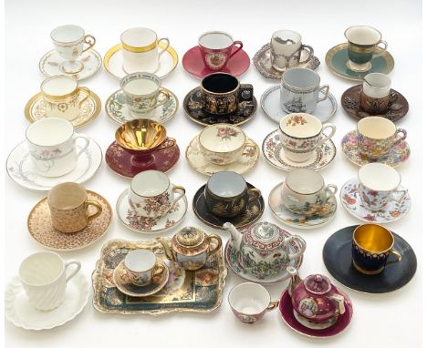 A collection of miscellaneous 19th century and later porcelain to include coffee cans and other cups and saucers, three teapo