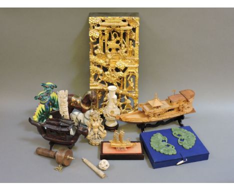A collection of 20th century Oriental items, including ivorine figures, a puzzle ball on stand, bone carved figures, a gilt c