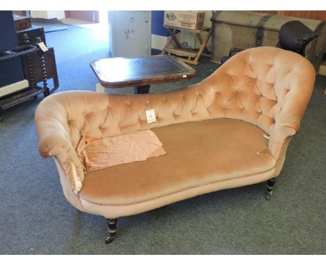 A Victorian button upholstered spoon back settee