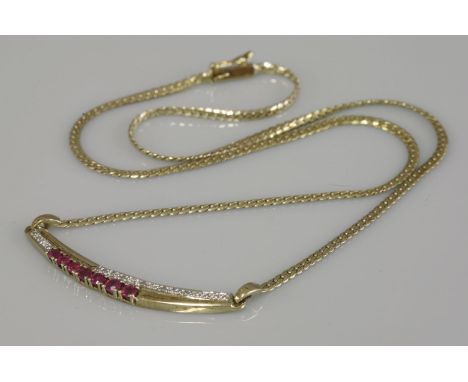 A 9ct gold ruby and diamond necklace, with a curved tapering bar centrepiece, London 1987, 6.50g