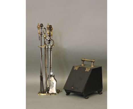 A set of three 19th century fireside tools, in later stand, Provenance: from a prominent Hertfordshire country house