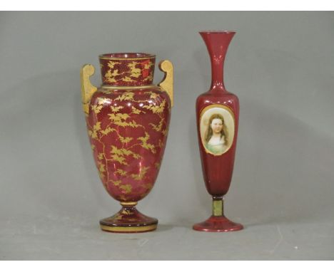 A Victorian cranberry glass vase, print/painted with a portrait of a lady, and another slender vase, 25.5cm and 28cm high