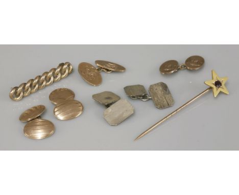 Two pairs of 9ct gold cufflinks, an American gold curb link bar brooch marked 10, a garnet set gold star stick pin marked 15,
